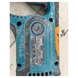 (2) Makita cordless rotary hammer drills: XRH04 with (2) 18V 3.0AH batteries & a DC18RC charger