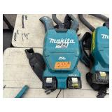 (4) Makita Backpack XCV05 Vacuums HEPA filters  (4) DC18RC chargers and (8) batterie