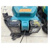 (4) Makita Backpack XCV05 Vacuums HEPA filters  (4) DC18RC chargers and (8) batterie