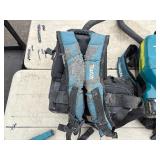 (4) Makita Backpack XCV05 Vacuums HEPA filters  (4) DC18RC chargers and (8) batterie