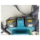 (4) Makita Backpack XCV05 Vacuums HEPA filters  (4) DC18RC chargers and (8) batterie