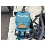 (4) Makita Backpack XCV05 Vacuums HEPA filters  (4) DC18RC chargers and (8) batteries