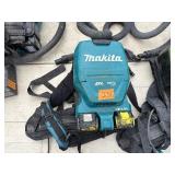 (4) Makita Backpack XCV05 Vacuums HEPA filters  (4) DC18RC chargers and (8) batteries