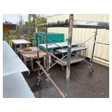 Scaffolding 6’ tall with 3 145” planks and 2 80” planks