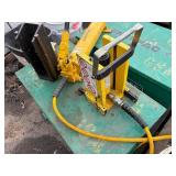 Enerpac hydraulic piston pump in a Greenlee storage box