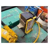 Enerpac hydraulic piston pump in a Greenlee storage box