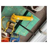 Enerpac hydraulic piston pump in a Greenlee storage box