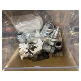 Electric and plumbing parts: Halex EMT Compression Connectors; Cushioned clamps; insulated tap