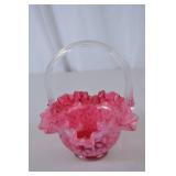 Pink Fenton opalescent glass basket with clear handle, ruffled rim, floral pattern