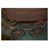 Antique Wicker Baby Carriage with Iron Frame and Wheels