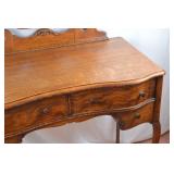Antique Oak Vanity with Beveled Mirror and Serpentine Front