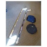 Hockey Sticks and Disc Golf Bags
