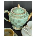 Variety of Vintage Painted Porcelain Teacups and Teapots