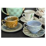 Variety of Vintage Painted Porcelain Teacups and Teapots
