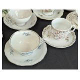 Variety of Vintage Painted Porcelain Teacups and Teapots