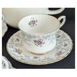 Variety of Vintage Painted Porcelain Teacups and Teapots