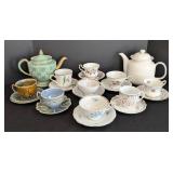 Variety of Vintage Painted Porcelain Teacups and Teapots