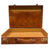 Vintage Leather Briefcase with Assorted File Folders and Office Supplies