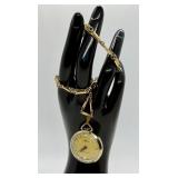 Harvester Pocket Watch with 24 Inch Gold Tone Chain