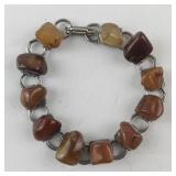 7.5 Inch Base Metal Bracelet with Polished Stone Accents