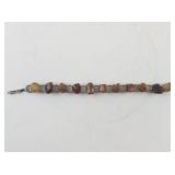 7.5 Inch Base Metal Bracelet with Polished Stone Accents
