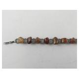 7.5 Inch Base Metal Bracelet with Polished Stone Accents