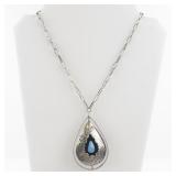 Sterling Silver Reversible Pendant Necklace with Turquoise and Coral Inlay.
