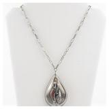 Sterling Silver Reversible Pendant Necklace with Turquoise and Coral Inlay.