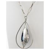 Sterling Silver Reversible Pendant Necklace with Turquoise and Coral Inlay.