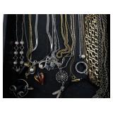 Mixed Jewelry Lot with Necklaces, Earrings, and Charms