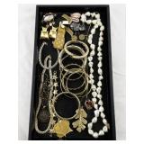 Assorted Costume Jewelry Collection with Necklaces, Bangles, and Brooches