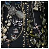 Large Costume Jewelry Collection with Necklaces, Brooches, Earrings, and Bracelets