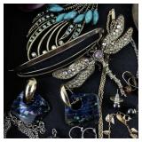 Large Costume Jewelry Collection with Necklaces, Brooches, Earrings, and Bracelets