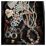 Large Costume Jewelry Collection with Necklaces, Brooches, Earrings, and Bracelets