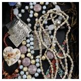 Large Costume Jewelry Collection with Necklaces, Brooches, Earrings, and Bracelets