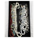 Collection of Beaded and Faux Pearl Necklaces with Assorted Colors and Styles