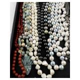 Collection of Beaded and Faux Pearl Necklaces with Assorted Colors and Styles