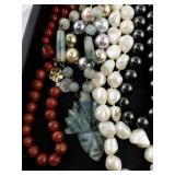 Collection of Beaded and Faux Pearl Necklaces with Assorted Colors and Styles