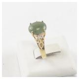 Size 5 Gold Tone Ring with Green Stone and CZ Accents