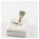 Size 5 Gold Tone Ring with Green Stone and CZ Accents