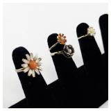 Group of 4 Vintage Base Metal Floral Rings Size 5-8
