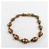 7.5in Gold Tone Base Metal Ladybug Link Bracelet