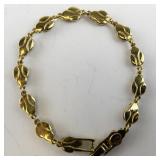 7.5in Gold Tone Base Metal Ladybug Link Bracelet