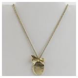 Gold Tone Base Metal Locket Necklace with Bow Accent