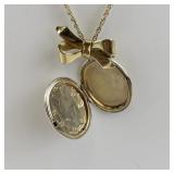 Gold Tone Base Metal Locket Necklace with Bow Accent