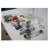 Kitchen Utensils and Rubbermaid Bin
