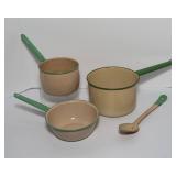 Four Pieces of Cream and Green Enamelware