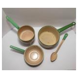 Four Pieces of Cream and Green Enamelware