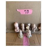 Kewpie figurines (8)