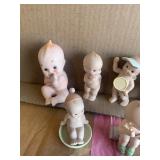 Kewpie figurines (8)